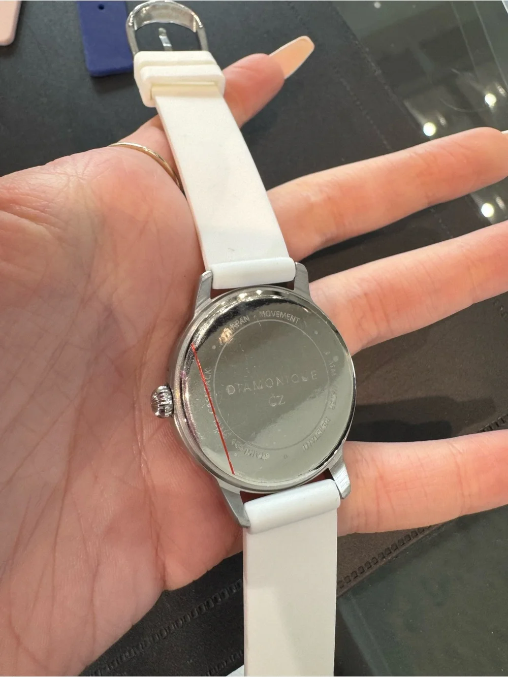 New DMQ Women’s silver tone & white Watch w Crystal Markers and rubber Strap.